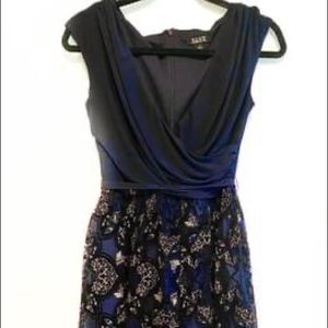 Brand new! Beautiful cocktail dress in navy blue and gold with lace work